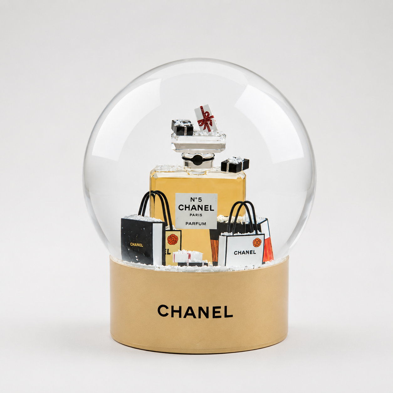 CHANEL Beauté Limited Edition Gold Snow Globe Perfume Bottle – Exclusive Collectible