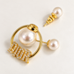 Luxury Gold-Tone Pearl Hoop Earrings with Sparkling Crystal Logo – Elegant Statement Jewelry